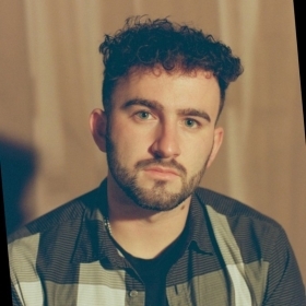 Headshot of Jason P. Wright, a psychology major who successfully transitioned into the music industry with the help of career services.