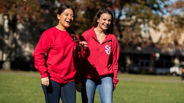Two UG Students walking on campus