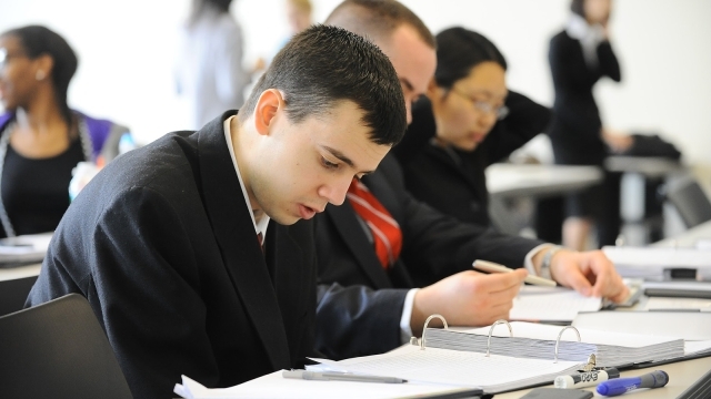Male student working in classroom