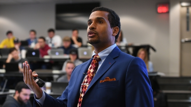 Professor Evans speaking to class