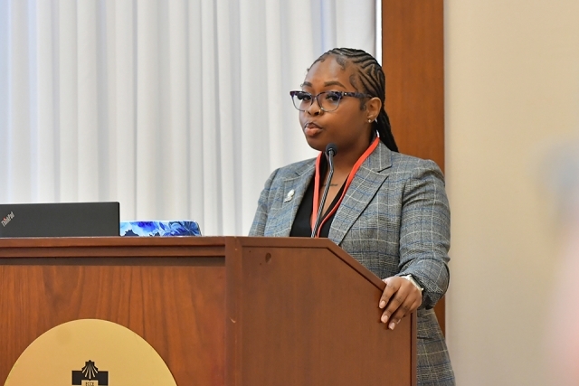Student speaking at podium