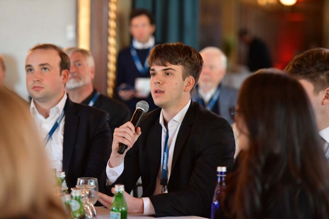 BIG EAST Summit student attendee speaking into microphone