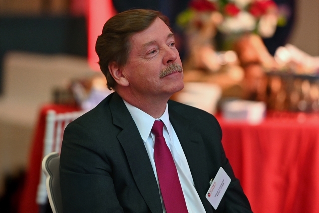 William J. Janetschek ’84CBA, ’17HON sitting in chair at St. John's campaign launch event