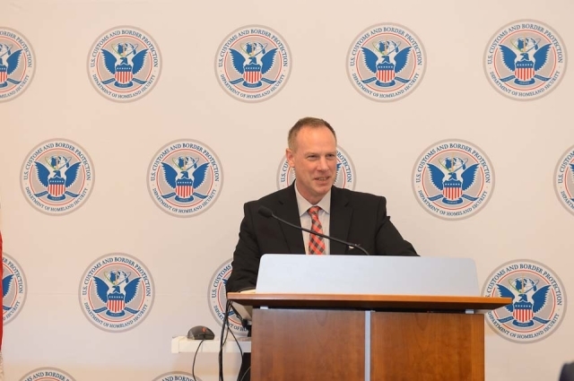 Man speaking at podium