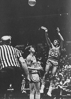 Joe DePre shooting a basketball in black and white